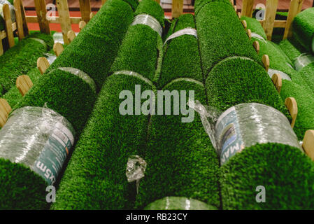 Valencia, Spain - January 3, 2019: Rolls of fake plastic grass to reform gardens. Stock Photo