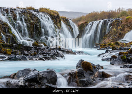 tremendous smooth water in icelandic waterfall Bruarfoss Stock Photo