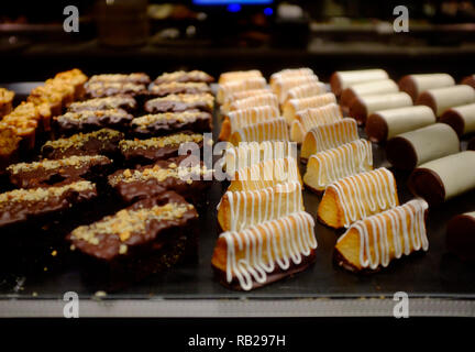 cakes and pasteries on display in the window of the danish bakery Ole & Steen, haymarket , london Stock Photo