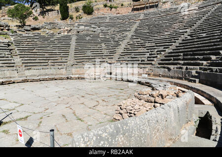 The ruins in Delphi, an archaeological site in Greece at the Mount Parnassus. Delphi is famous by the oracle at the sanctuary dedicated to Apollo. UNE Stock Photo