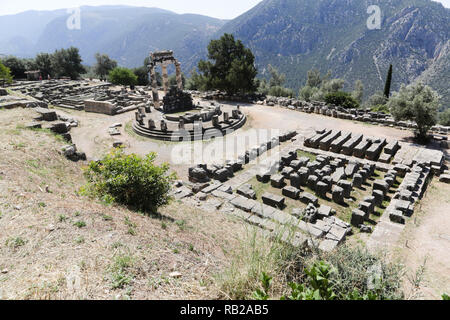 The ruins in Delphi, an archaeological site in Greece at the Mount Parnassus. Delphi is famous by the oracle at the sanctuary dedicated to Apollo. UNE Stock Photo