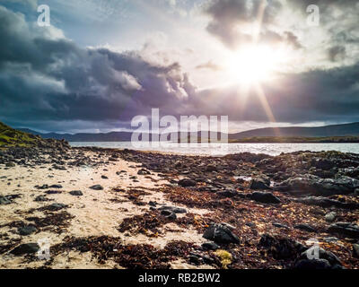 Dramatic sky at coral beach on the Isle of Skye island in Scotland - United Kingdom Stock Photo