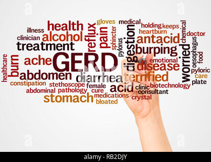 GERD - Gastroesophageal Reflux Disease, word cloud and hand with marker concept on white background. Stock Photo