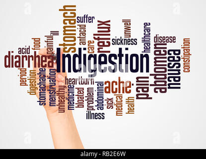 Indigestion word cloud and hand with marker concept on white background. Stock Photo