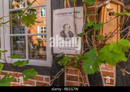 Plaque commemorating the composer Carl Maria von Weber, saying the composer didi not live in this house, Eutin, Schleswig-Holstein, Germany Stock Photo