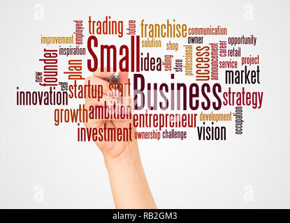 Small Business word cloud and hand with marker concept on white background. Stock Photo