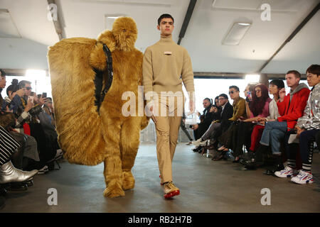 Models on the catwalk during the Xander Zhou at London Fashion