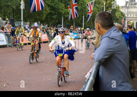 Cyclists racing along The Mall with onlooking crowd, Brompton World Championships 2018, London, UK Stock Photo