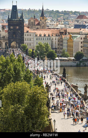 PRAGUE, CZECH REPUBLIC - JULY 2018: Aerial view of the Charles Bridge in Prague from from the top of the Lesser Town Bridge Tower. Stock Photo