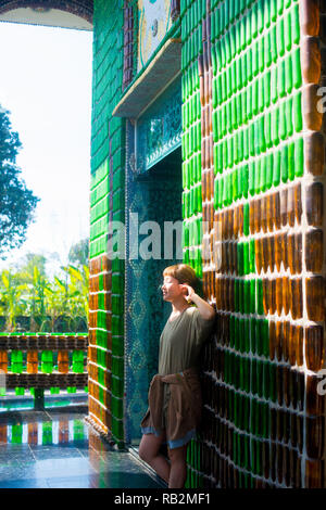 Asian female model poses for pictures in the outdoors Stock Photo