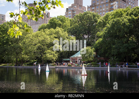 Model sailboats in the Conservatory Water in Central Park, New York. Stock Photo