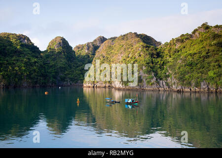 Stunning limestone karst mountains in Bai Tu Long Bay, Vietnam. Stock Photo