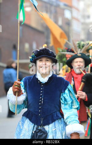 London, UK. 06th Jan, 2019. Twelfth Night celebrations on January 6th in the Bankside area of London. The amazing Holly Man is piped over the Millennium Bridge to Shakepeare's Globe. Credit: Monica Wells/Alamy Live News Stock Photo
