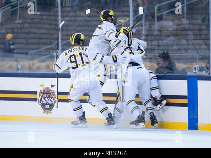 Indiana, USA. 05th Jan, 2019. Michigan players celebrate goal during NCAA Hockey game action between the Michigan Wolverines and the Notre Dame Fighting Irish at Notre Dame Stadium in Indiana. Michigan defeated Notre Dame 4-2. John Mersits/CSM/Alamy Live News Stock Photo