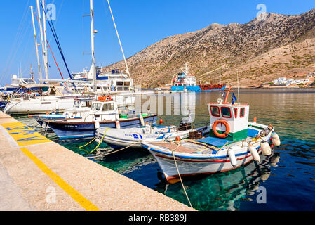SIFNOS, GREECE - September 10, 2018: Colorful boas in the port of Kamares. Sifnos island, Greece Stock Photo
