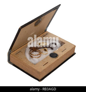 Fake book to hide valuables. Vintage safe, vault. Isolated on white. With key, jewels. Stock Photo