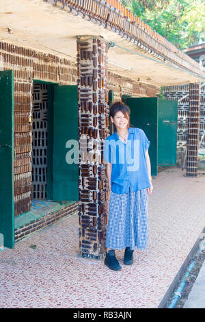 Asian female model poses for pictures in the outdoors Stock Photo