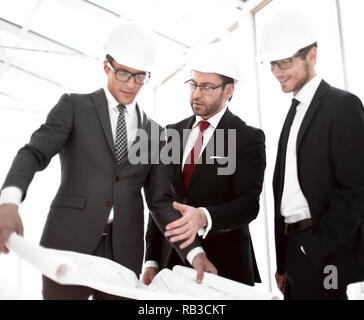businessman asks questions to the chief architect Stock Photo