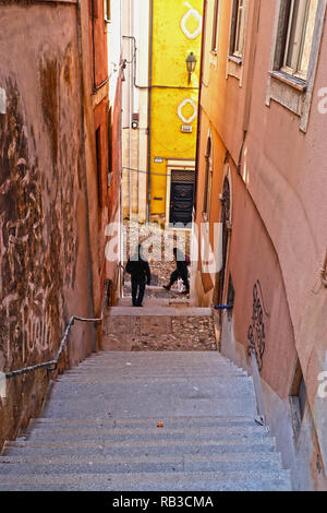 Going about your business on a late Winters afternoon, Coimbra, Portugal Stock Photo