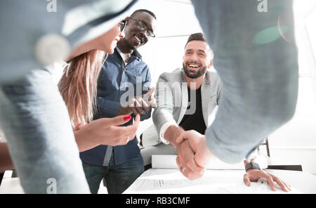 close up.architect and customer shaking hands Stock Photo