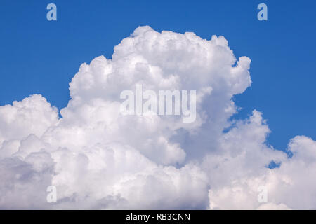Big puffy clouds fresh blue sky Stock Photo