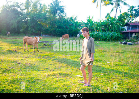 Asian female model poses for pictures in the nature Stock Photo