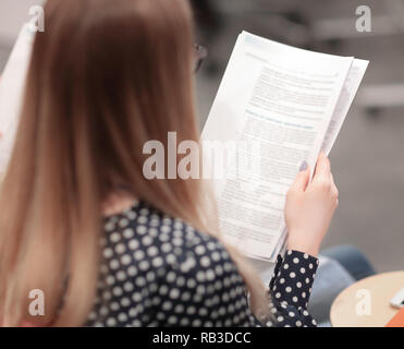 close up.business partners are reviewing the conditions of the contract. Stock Photo