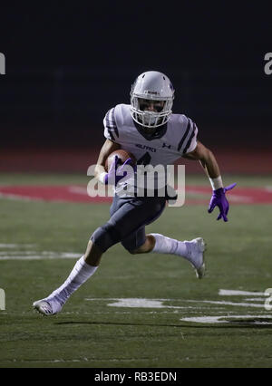 Football action with Shasta vs. Foothill High School in Palo Cedro, California. Stock Photo