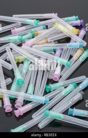 Close-up of hypodermic needles. Specifically BD Microlance brand (see Add. Info). Metaphor NHS, inoculation, flu jab, business cash injection. Stock Photo