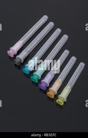 Close-up of hypodermic needles. Specifically BD Microlance brand (see Add. Info). Metaphor NHS, inoculation, flu jab, business cash injection. Stock Photo