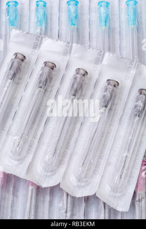Close-up of hypodermic needles. Specifically BD Microlance brand (Add. Info for types). Metaphor NHS, inoculation, flu jab, medical supplies. Stock Photo