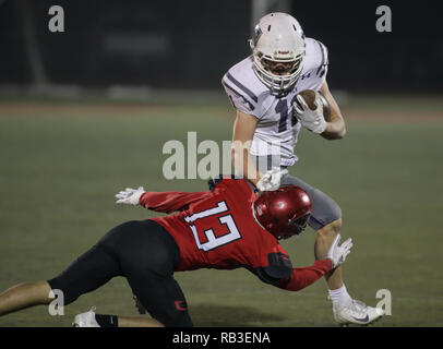 Football action with Shasta vs. Foothill High School in Palo Cedro, California. Stock Photo