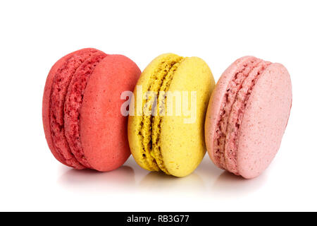 three macaroons isolated on white background closeup Stock Photo