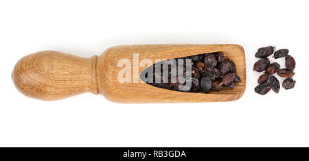 dry red barberry spices on scoop isolated on a white background. Top view. Flat lay Stock Photo