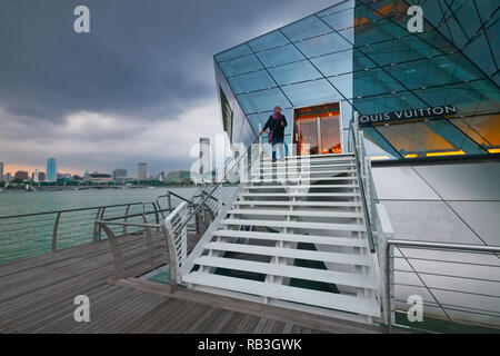 Louis Vuitton Island Maison in Marina Bay, Singapore, and accessible by a  pedestrian bridge or underground from The Shoppes at Marina Bay Sands Stock  Photo - Alamy