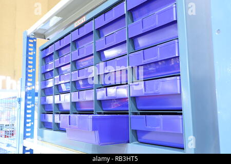 Plastic drawer for keeping parts in factory Stock Photo