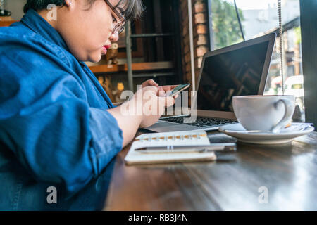Young girl texting message on smart phone