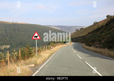 Sheep Crossing Sign, Horseshoe Pass, popular with hikers, near Llangollen, Denbighshire, North Wales, Wales, United Kingdom Stock Photo