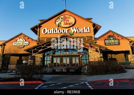 A logo sign outside of a Bass Pro Shops Outdoor World retail store in Harrisburg, Pennsylvania, on December 29, 2018. Stock Photo