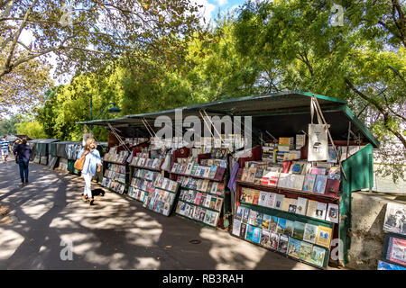 Bouquinistes de Paris along the Banks of The River Seine ,green painted kiosks selling second hand books,magazines and prints, Quai De Conti ,Paris Stock Photo