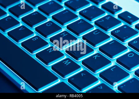Computer keyboard keys. Modern, compact keyboard in white and black color. Technology design. Stock Photo