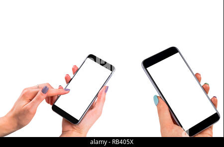Beautiful Woman hands holding two smart phone with isolated white screen. Business workplace with copy space. Empty space for text. Isolated screen fo Stock Photo