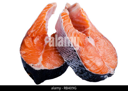 Fresh salmon steak isolated on the white background. Salmon Red Fish Steak. Large Pile of trout steak. Big organic steaks of salmon lined up. Big piec Stock Photo