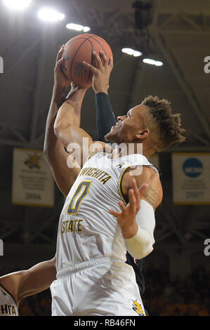 Wichita, Kansas, USA. 06th Jan, 2019. Wichita State Shockers guard Dexter Dennis (0) battles for a rebound during the NCAA Basketball Game between the Temple Owls and the Wichita State Shockers at Charles Koch Arena in Wichita, Kansas. Kendall Shaw/CSM/Alamy Live News Stock Photo