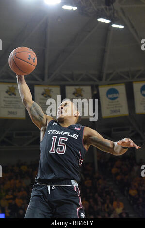 Wichita, Kansas, USA. 06th Jan, 2019. Temple Owls guard Nate Pierre-Louis (15) goes to the basket for a dunk during the NCAA Basketball Game between the Temple Owls and the Wichita State Shockers at Charles Koch Arena in Wichita, Kansas. Kendall Shaw/CSM/Alamy Live News Stock Photo