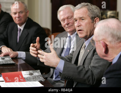 Washington, DISTRICT OF COLUMBIA, USA. 29th Jan, 2007. U.S. President George W. Bush (2R) speaks to the media after a meeting with members of Securing America's Future Energy in the Roosevelt Room of the White House in Washington, DC Monday 29 January 2007. Pictured here are (L to R) Mike Jackson, Chairman and C.E.O. of AutoNation, Herb Kelleher, Executive Chairman of Southwest Airlines Company, Bush, and Retired Marine Corps General P.X. Kelley. dpa Picture-Alliance OUT Credit: Matthew Cavanaugh/CNP/ZUMA Wire/Alamy Live News Stock Photo