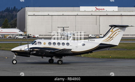 Richmond, British Columbia, Canada. 1st Jan, 2019. A Beechcraft 200 Super King Air (C-FZVX) turboprop airplane, belonging to North Cariboo Air, taxies along the tarmac at Vancouver International Airport. Credit: Bayne Stanley/ZUMA Wire/Alamy Live News Stock Photo