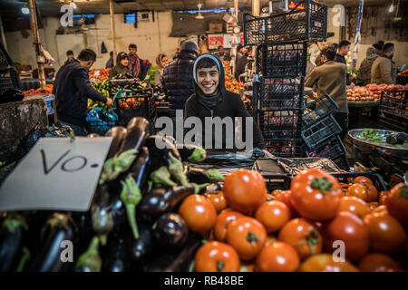 Zakho, Duhok Governorate, Iraq. 31st Dec, 2018. A child seen selling vegetables in the town of Zakho in Kurdistan Iraq. Credit: Geovien So/SOPA Images/ZUMA Wire/Alamy Live News Stock Photo