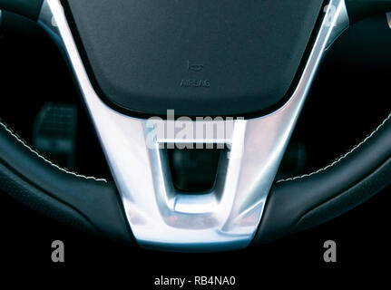 Close up view of steering wheel, Black leather car interior design, details Stock Photo