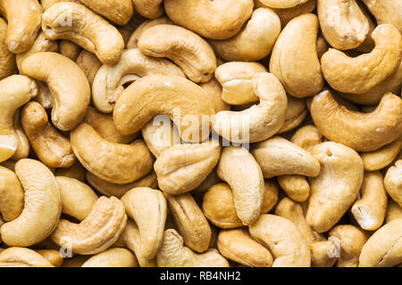 Roasted cashew nuts. Texture of nuts. Top view. Stock Photo